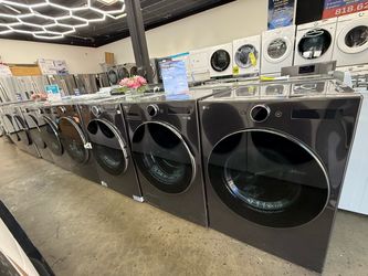 New open box LG charcoal stainless steel front load washer and gas dryer set
