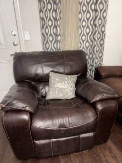 minibar, reclining sofa, and coffee table