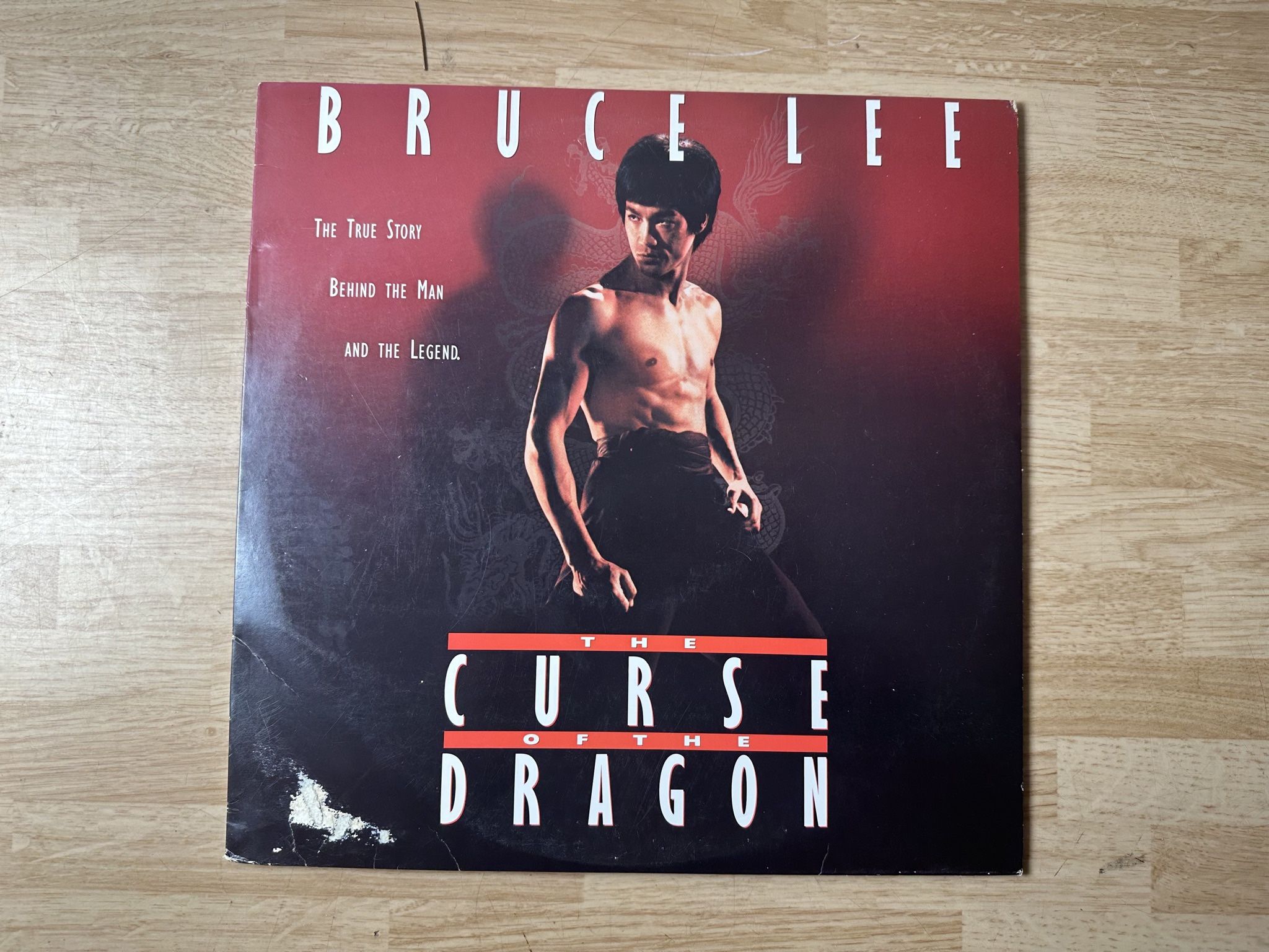 BRUCE LEE - THE CURSE OF THE DRAGON - LASERDISC - LD - 1993 USED DISC IS IN GREAT SHAPE. PLAYED ONCE. COVER HAS ONE SPOT WITH DAMAGE MAY HAVE CORNER