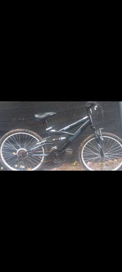 Next PX 4.0 full suspension mountain bike. Boys 24" wheel, 18 speed Shimano equipped