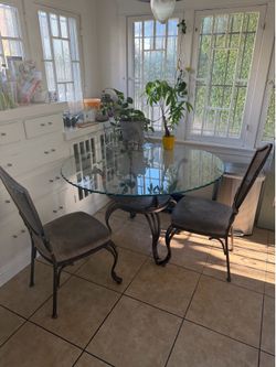 Metal frame glass table