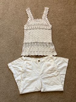 ivory crochet and lace tank top paired with wide-leg pant