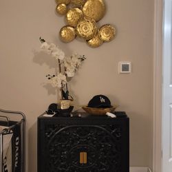 Hand Carved Accent Table With Gold Wall Decor 