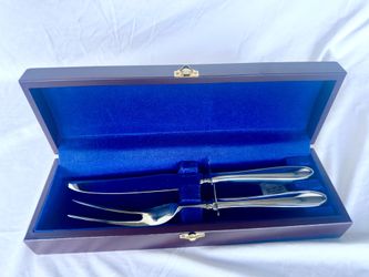 Hampton Silversmiths stainless steel carving set in velvet lined wooden presentation box.