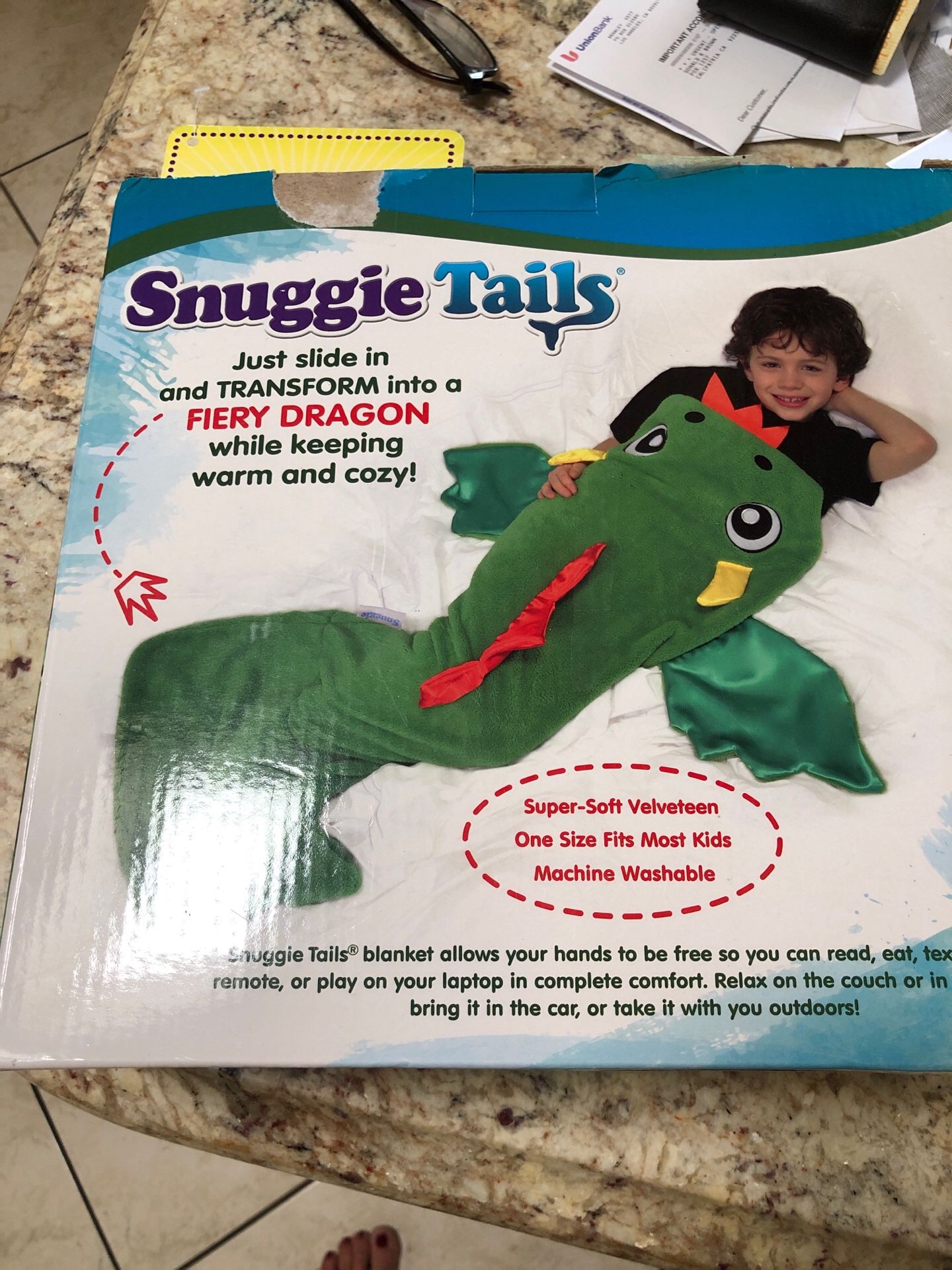 new in box still dragon Snuggie tail 12$