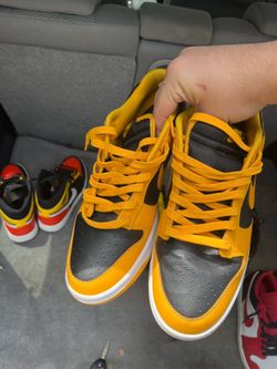 Jordan 1 lows black n yellow