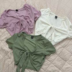 pink, white, green crop tops