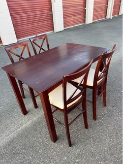 Wooden high table and four chairs