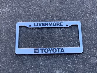 License plate frame chrome color plastic material Livermore Toyota Logo