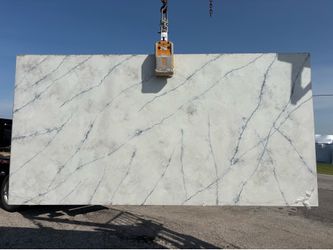 Quartz slabs   127”x 64”x3 cm   $700 per slab plus  tax ,  I have a lot of backsplash mosaic tiles bargain prices Come visit us you won’t be disappoin