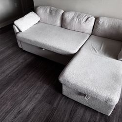 Moving Sale - Modern beige sectional sofa with pull-out extension and storage