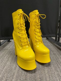 Women’s yellow chunky high heel boots