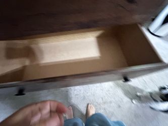 Dark Wood Dresser with Open Drawer