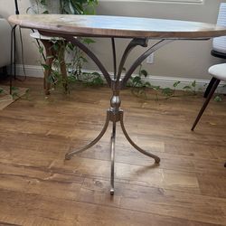 Solid wood top dining or side table.