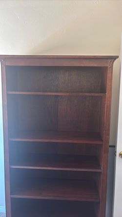 Dark wood shelving / adjustable shelves