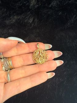 14k sand dollar pendant