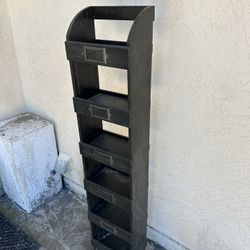 CD/Dvd Cabinet. 51”h X 10”w.