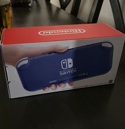 Nintendo switch in the box with charger