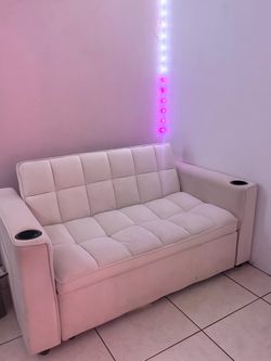 Ivory sofa couch with charging ports and pockets