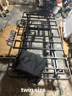 brand new remote twin sized bed and used mattress