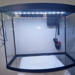 20 Gallon Tank With Top Light And Filter Still In Good Condition