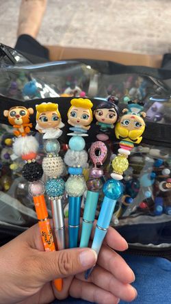 Doorable beaded pens