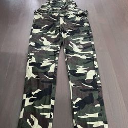 Women's ripped denim overall. Size M