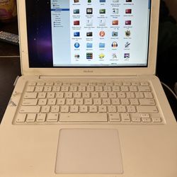 Macbook Unibody and two older ones and a Black one