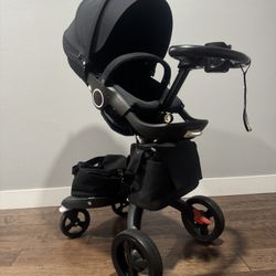 Stokke Xplory Black Stroller with Stokke nuna car seat