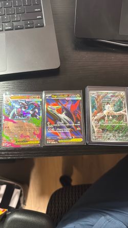 Pokemon TCG card Mega Charizard Mega Latias Meowth
