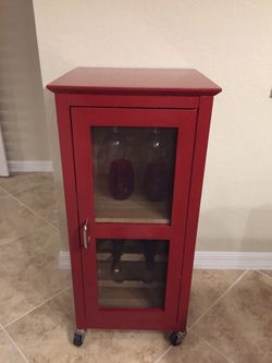 6 bottles of wine / glass rack on top and shelf for stash