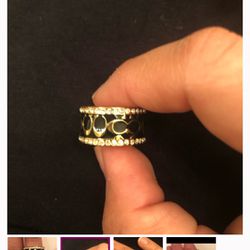 Woman’s Gold Coach Ring