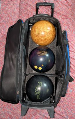 15 lb bowling balls & rolling case bag