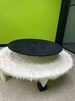 Round tiered top table. Fuzz fabric been removed it’s metal table