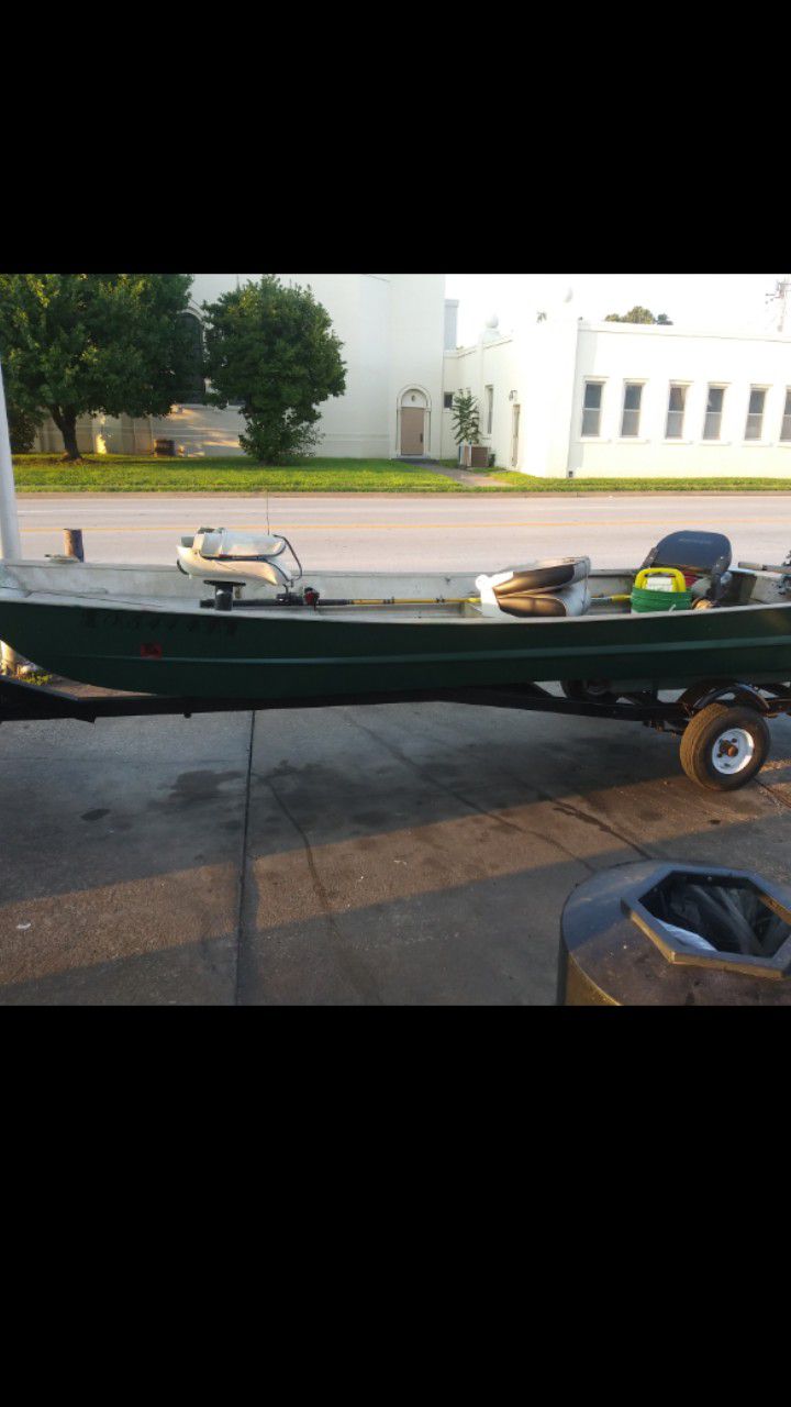 Photo 14 flat bottom boat with trailer and 9.9 Evinrude motor new tank and hoses all titles clear