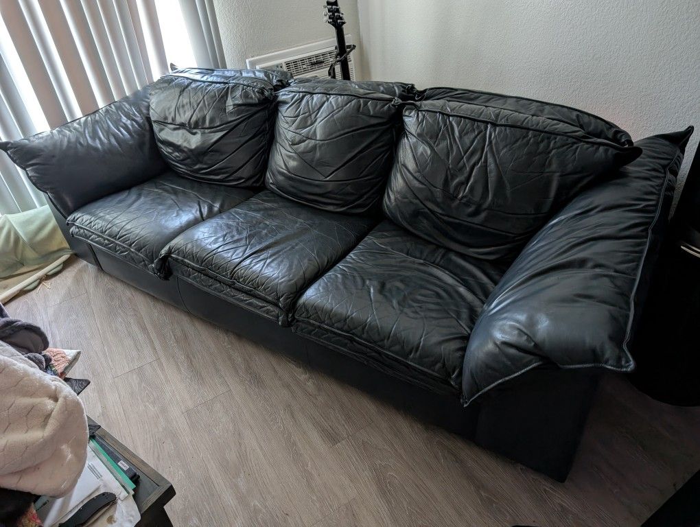 Dark blue leather couch $100