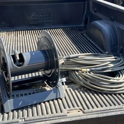 Pressure washing hose and reel