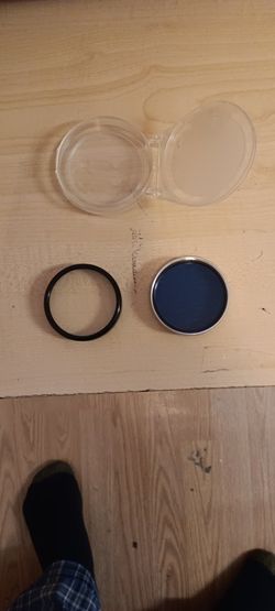2 Camara Lens Filters 2" Dia.  1 Come With A Case