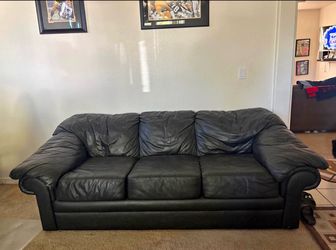 Beautiful black leather sofa couch