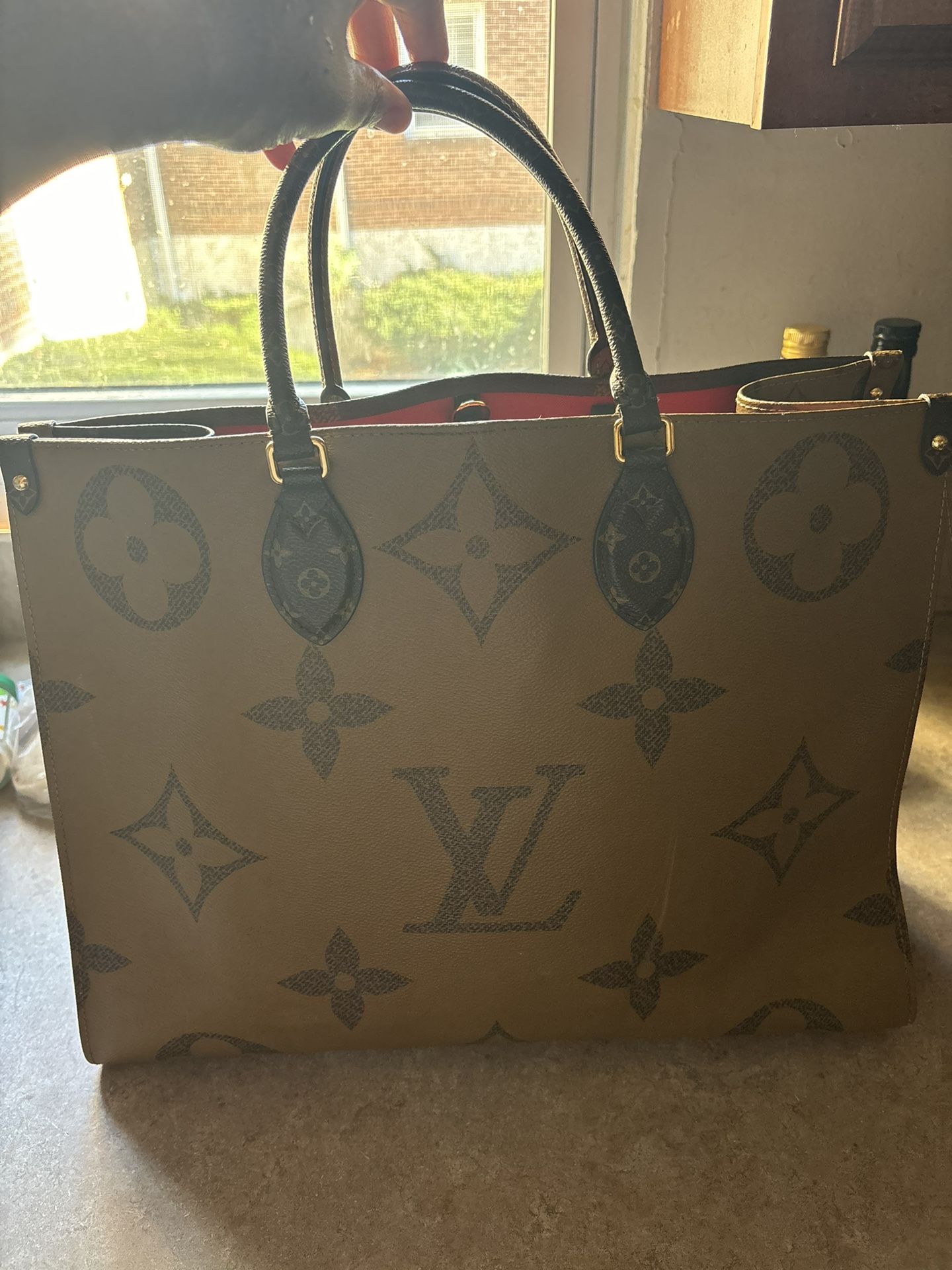 Louis Vuitton On The Go MM Bag