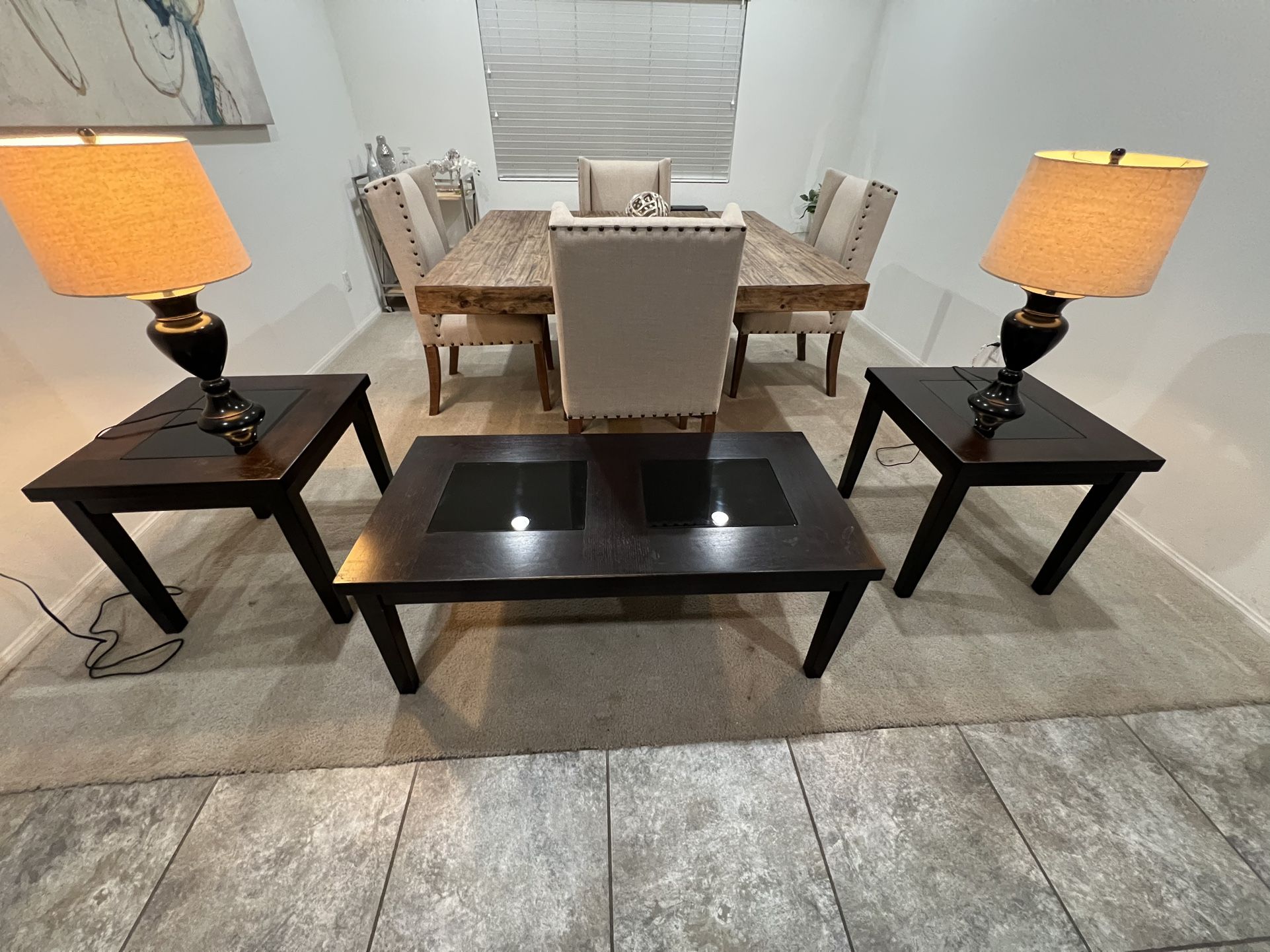coffee table(48”LX24”WX18”H) and end tables(24”LX22”WX22”H) X2 lamps included. (Dining room table n