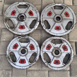 Pairs Of 35 And 45 Pound Olympic Weights