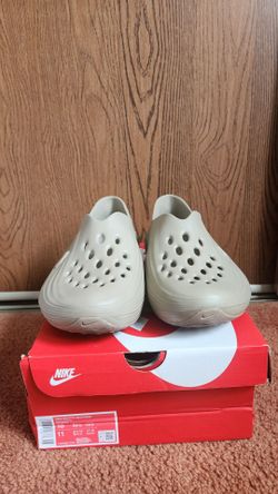 Nike size 10  Reactx Rejuven8 khaki color