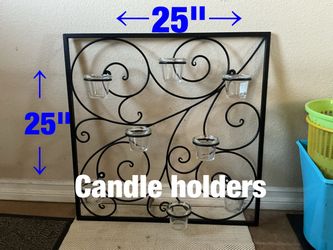 Decorative black metal candle holder with 8 glass cups  -  $30