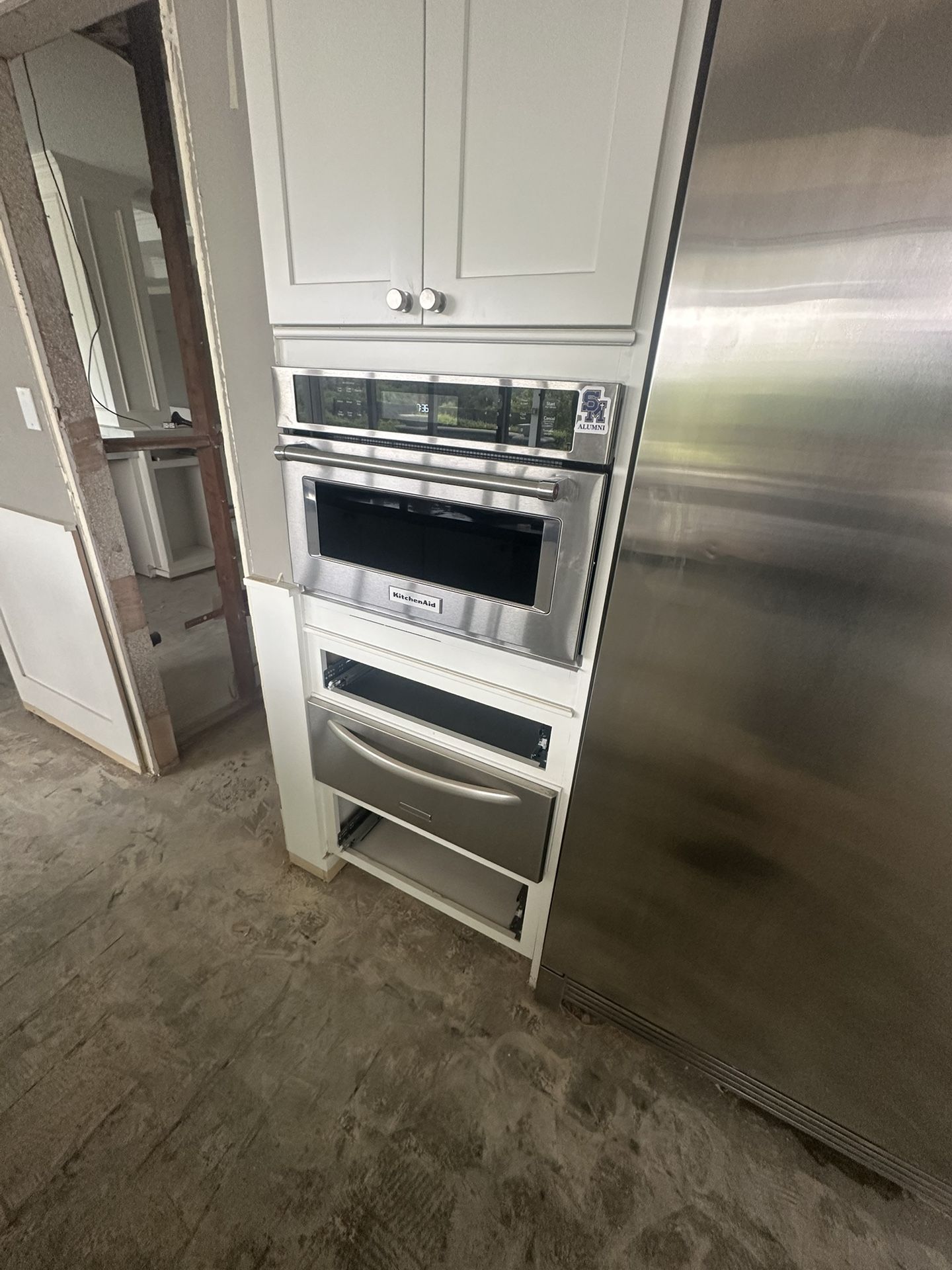 Kitchen Appliances - Electrolux Fridge / Freezer, Kitchen Aid Built In Microwave , Kitchen Aid Built In Warming Drawer, 36” American Gas Range
