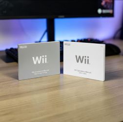 (Lot Of 2) Wii Operations Manual Channel/Settings System Setup Replacement Books. 
This is a set of two Nintendo Wii operation manuals: one for "Syste