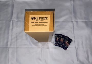 One Piece English Version 1st Anniversary Set and 3 Romance Dawn(blue bottom)booster packs