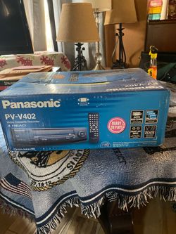 Factory sealed vintage Panasonic PV-V402 VCR player w 46 Disney moviea
