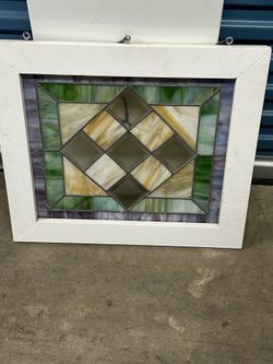 Antique stained glass solid frame ready to hang