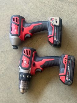 Milwaukee drills w/  batteries